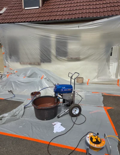 machine projection enduit facade sol protege chantier